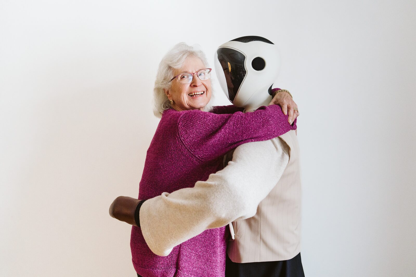 Family member hugging loved one through Robody